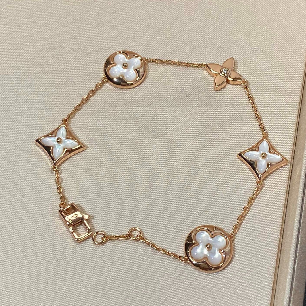 [LUCKY LOVE]STAR AND SUN 5 MOTIF MOP PINK GOLD BRACELET