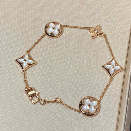 [LUCKY LOVE]STAR AND SUN 5 MOTIF MOP PINK GOLD BRACELET